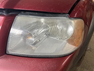 Conjunto de faros izquierdos usados se adapta a: Ford Freestyle 2005 grado B izquierdo Foto 1 de 4