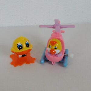 2 Easter Toys Wind Up Pink Helicopter Chick Pilot Changes Directions Flip Duck