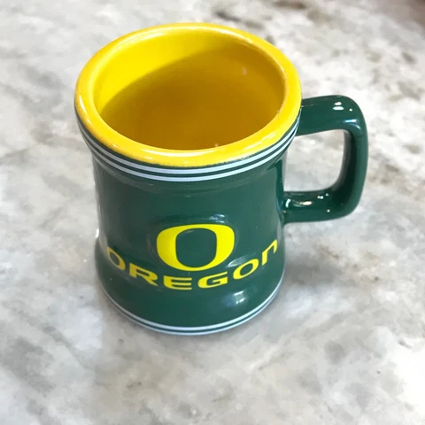 Oregon Ducks NCAA Licensed Sculpted Ceramic Mini Mug Style Shot Glass (2 Oz.) Cover