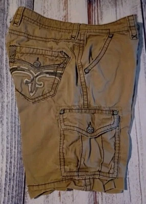 ROCK REVIVAL CARGO TALLA 40 PANTALONES CORTOS BORDADOS PKTS TRAVERTINO COSIDO GRUESO USADOS EN EXCELENTE ESTADO  Foto 1 de 4