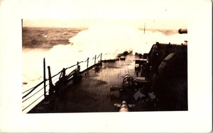 RPPC Postcard US Navy Battleship at Sea Wave Crashing Over Deck c1930 - Picture 1 of 2