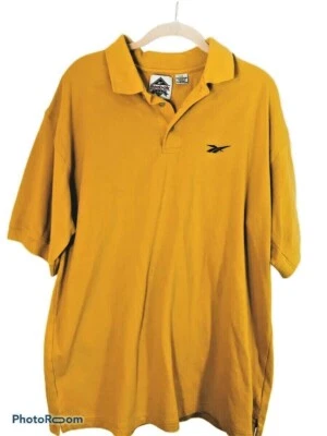Camisa polo de golf Reebok para hombre manga corta color mostaza talla grande Foto 1 de 4