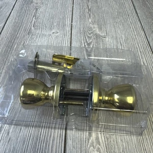 Kwikset Hall/Closet Passage Non Locking Door Knob Brass - Picture 1 of 5