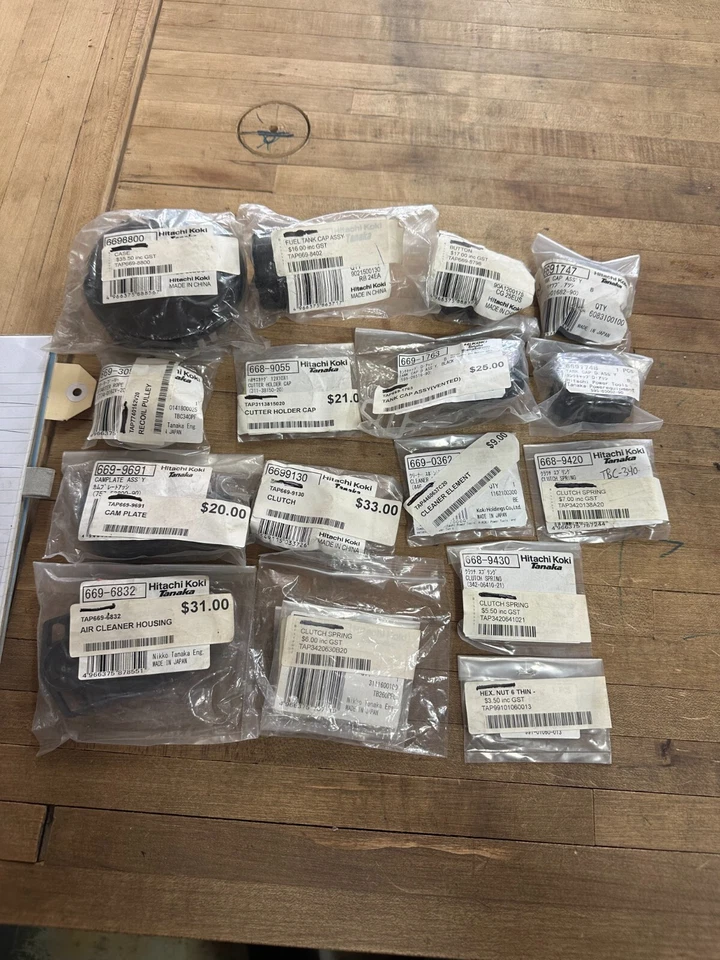 ASSORTED TANAKA PARTS (SPRINGS, CAPS, PULLEYS) - Image 1 of 1