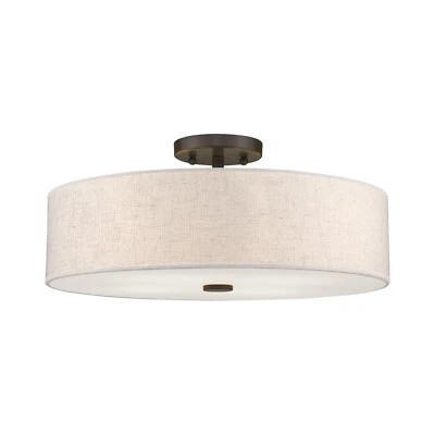Elevate any room with this semi-flush mount & oatmeal fabric drum shade. - Image 1 of 4