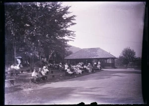 ANTIQUE GLASS NEGATIVE, PEOPLE AT PICNIC BENCHES, BANDSTAND, UNKNOWN LOCATION - Picture 1 of 1