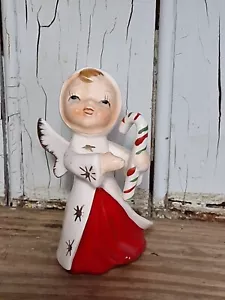 FIGURINA ANGELO DI NATALE NAPCO VINTAGE CHE TIENE CARAMELLE ORO STARBURST riparata - Foto 1 di 13