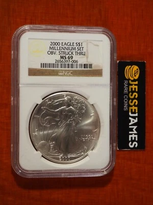 2000 AMERICAN SILVER EAGLE NGC MS69 FROM THE MILLENNIUM SET OBVERSE STRUCK THRU - Image 1 of 2