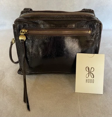 HOBO Dark Brown Glossy Leather Small Zip Top Crossbody Bag Purse Tasseled Pulls - Image 1 of 4
