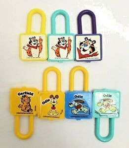 Vtg. 1978 Lot of 7 Kellogg's Cereal Odie, Garfield & Tony The Tiger PadLock Toy
