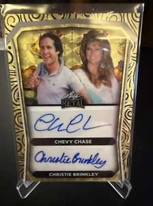 2024 Leaf Metal Holiday Chevy Chase/Christie Brinkley Auto Super prizmatic 1/1 - Picture 1 of 3