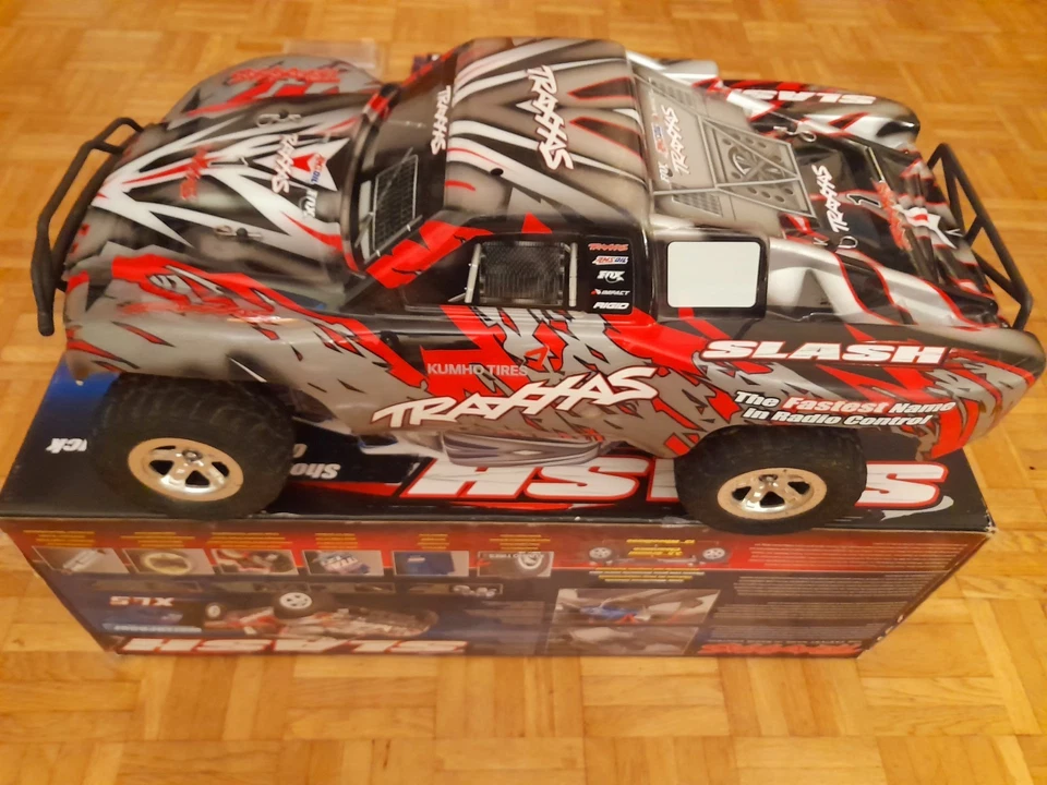 TRAXXAS SLASH 2 WD, mit Akku, Lader u. Ersatzrädern, OVP - Bild 1 von 4