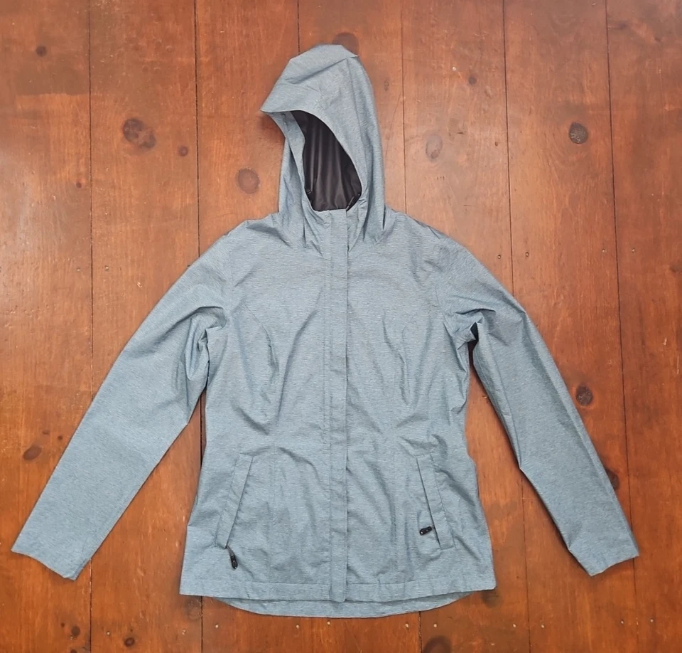 Chaqueta impermeable pequeña 32 Degrees Cool para mujer con capucha verde azulado Gorpcore senderismo A4 Foto 1 de 4
