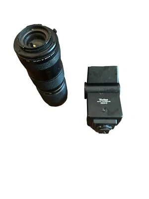 Vivitar 2800-D AUTO THYRISTOR ELECTRONIC BOUNCE FLASH and Camera Lens - Image 1 of 3