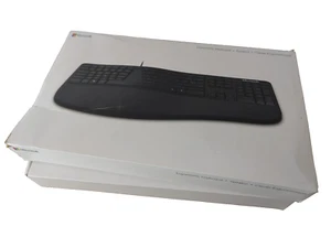 CLAVIER FILAIRE ERGONOMIQUE MICROSOFT NATUREL 4000 V 1.0. non testé - Photo 1/4