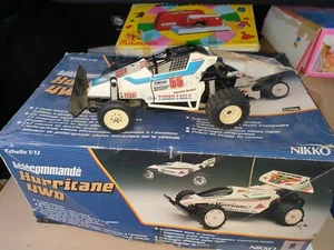 Lot of 2 remote controlled cars including NIKKO - HURRICANE 4WD - RC BUGGY 1/12 - Picture 1 of 12