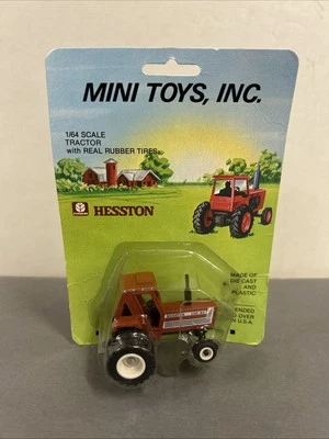 1/64 Mini Toys Hesston 130-90 Tractor 4wd With Duals In Package - Image 1 of 4