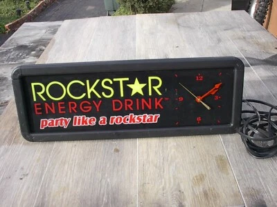 LETRERO ILUMINADO ROCKSTAR ENERGY DRINK CON RELOJ, 20 X 7 X 6 PULGADAS, FUNCIONA. Foto 1 de 4