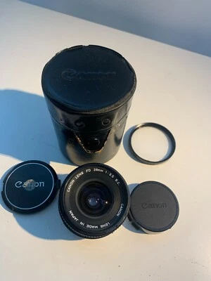 Objetivo Canon 28mm f:3.5 FD Prime Cromo con estuche y tapas originales Foto 1 de 4