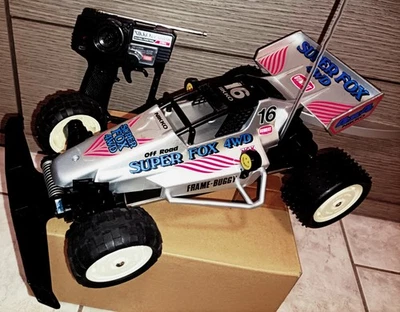 NIKKO SUPER FOX 4WD FRAME BUGGY 27MHZ 1/14 - Immagine 1 di 4