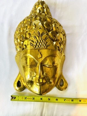 Máscara de Buda dorada colgante de pared madera 13”x7,5” Bali Foto 1 de 4
