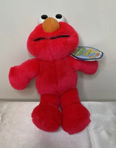 Peluche vintage Fisher Price Elmo rosso Sesame Street 10" NUOVO - Foto 1 di 11