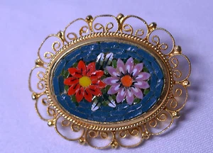 VINTAGE HANDCRAFTED MOSAIC FLOWER PIN ON TEAL IN A FILIGREE FRAME - ITALY - Picture 1 of 3
