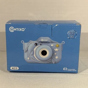 Macchina fotografica per bambini Contixo - fotocamera digitale per bambini - delfino blu - Foto 1 di 8