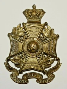 BRITISH MILITARY CAP BADGES, The 34th Cumberland Regiment of Foot Brass 1874-81 - Foto 1 di 2