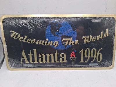 Placa de licencia vintage de los Juegos Olímpicos de Atlanta 1996 "Bienvenido al mundo" sellada  Foto 1 de 4
