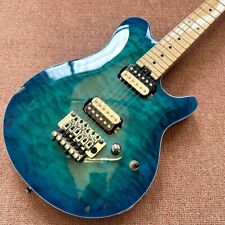 Guitarras eléctricas de arce acolchado azul personalizadas de fábrica, costuras de piezas divididas for sale