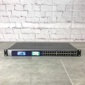 Commutateur géré combiné SFP Netgear ProSafe FSM726v3 24 ports 10/100 RJ-45 2 ports 1G - Photo 1/8