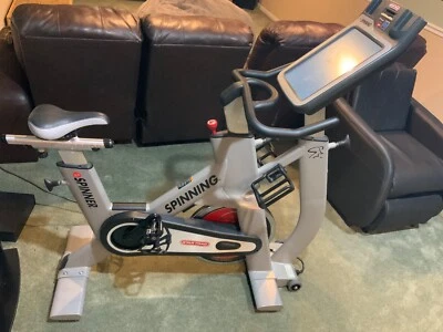 Star Trac eSpinner stationary bike with pre loaded video trainer - Image 1 of 4