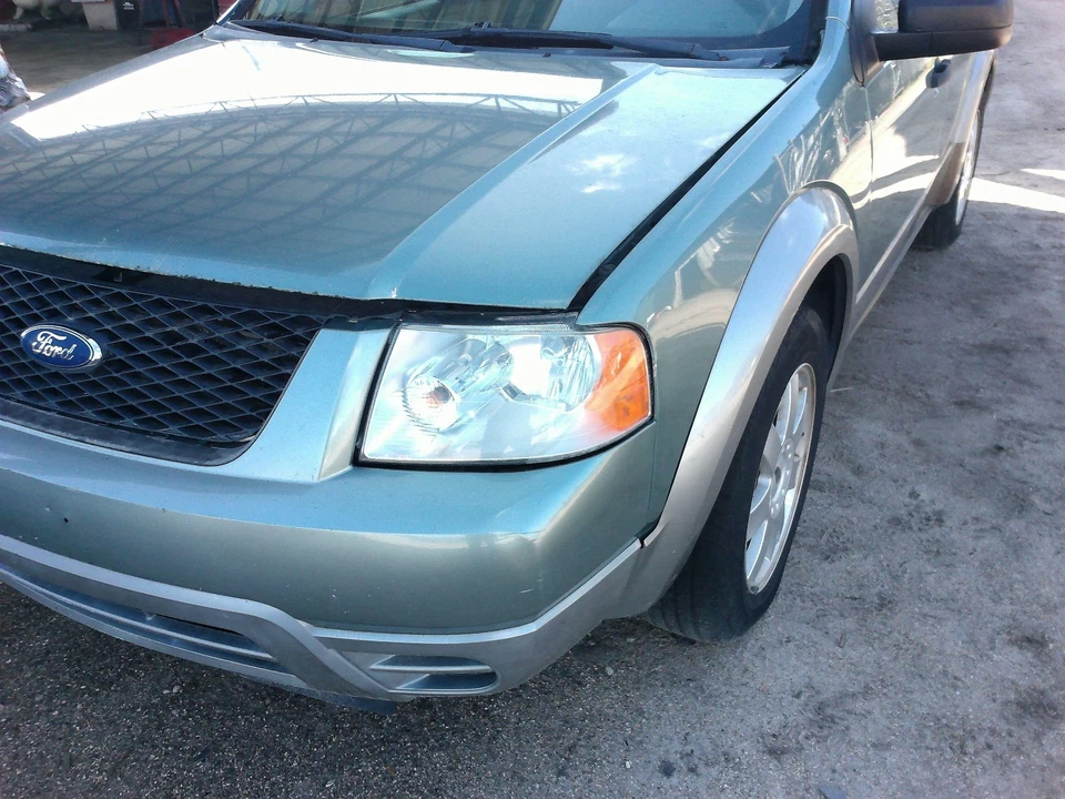 Conjunto de faros izquierdo FORD FREESTYLE 05 06 07 Foto 1 de 1