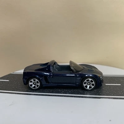 2009 Matchbox 10-Pack Design Exclusive Opel Speedster Metallic Blue 1:64 NM - Image 1 of 4