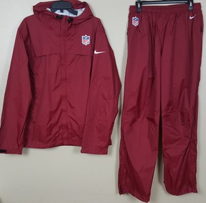 grey nike tracksuit with red tick