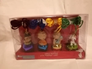 NIB SET OF 4 PEANUTS SNOOPY JINGLE BUDDIES JINGLE BELL PENDANTS NECKLACES - Picture 1 of 5