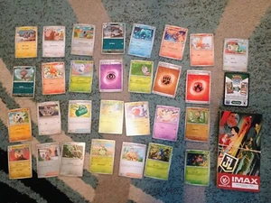 Pokemon Karten + Regal IMAX Tickets - Bild 1 von 2