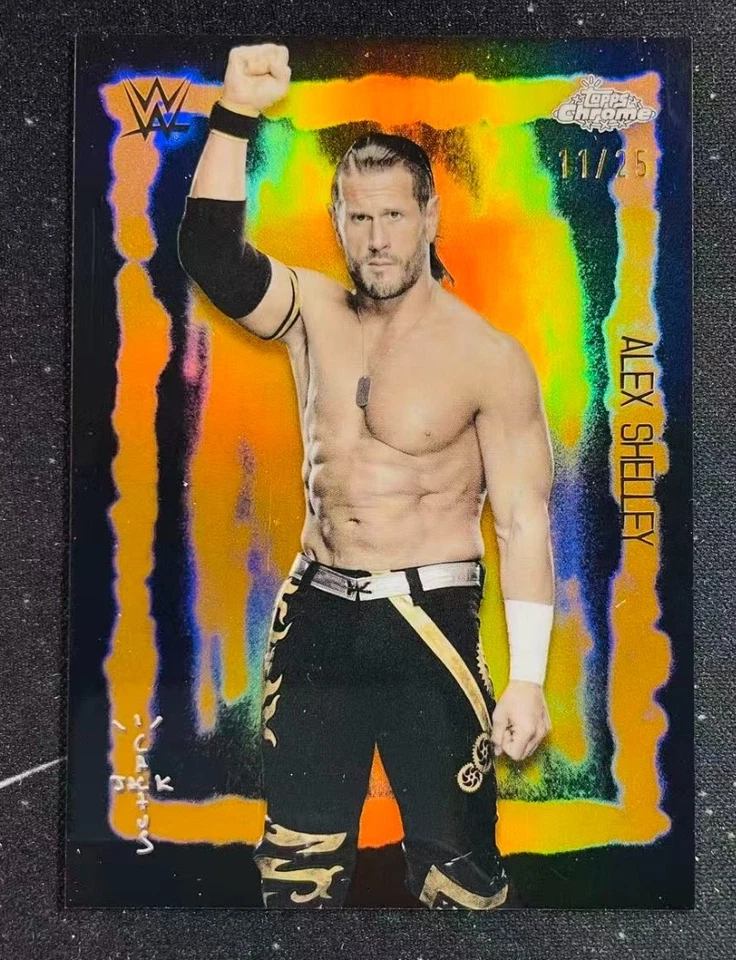 2025 Topps Chrome WWE X Cactus Jack Alex Shelley Festiva Fury Orange #11/25 - Image 1 of 4