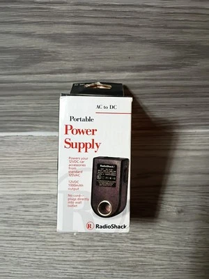 Radioshack AC&DC Fuente de Alimentación Portátil Convertir 120V a 12V Enchufe Interior Coche  Foto 1 de 4