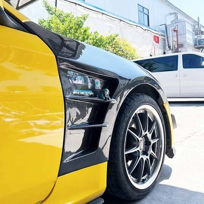 Par de guardabarros delanteros ventilados de carbono real para Hyundai Genesis cupé 2010-2016 brillante Foto 1 de 4