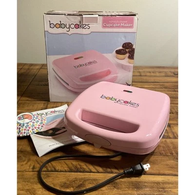 Máquina antiadherente para hacer cupcakes Babycakes rosa 8 mini cupcakes CC2828PK con caja Foto 1 de 4
