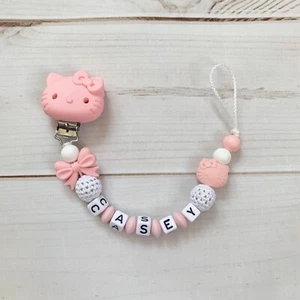 Schnullerkette Nuckelkette Beißkette mit Namen rosa weiß Silikon Mädchen - Bild 1 von 1
