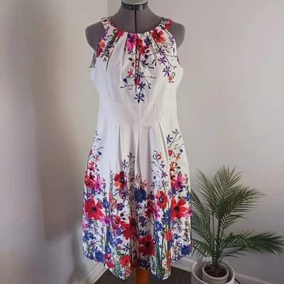Vestido para mujer Nine West talla 10 rosa floral midi calce y acampanado bolsillos sin mangas  Foto 1 de 4