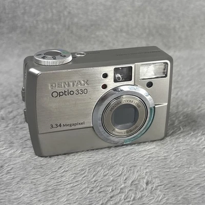 PENTAX  Optio 330 3.34mp Digital Camera Silver,  128mb CF, No Battery Or Charger - Image 1 of 4
