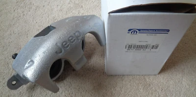Jeep Commander LH 2009 2010 pinza de freno delantera nueva OEM MOPAR 05143693AC Foto 1 de 4