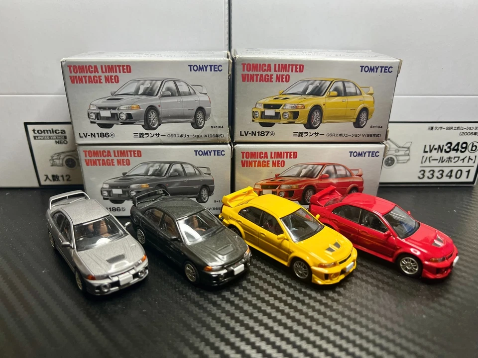 Tomica Limited Vintage 1/64 Mitsubishi Lancer Evolution 4&5 (Grey/Red/Yellow) - Image 1 of 1