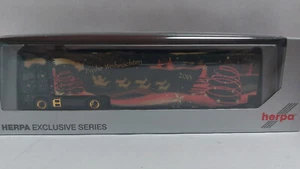 Herpa MAN TGX XXL Euro 6 KofferSattelzug Herpa Weihnachtstruck 2013 1/87 (25/05) - Bild 1 von 2