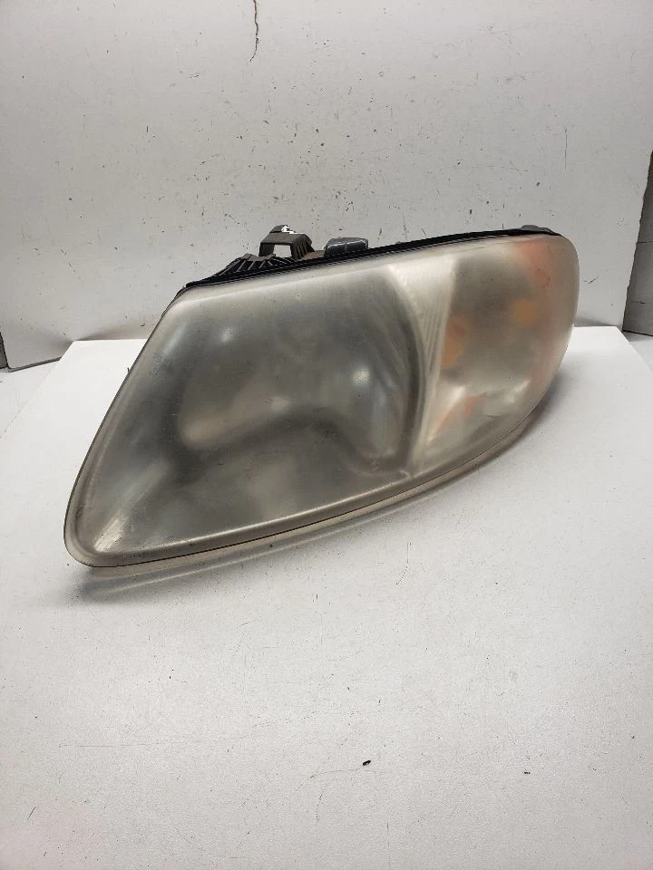 Driver Left Headlight Fits 01-07 CARAVAN 1432119 - Image 1 of 4