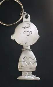 Pewter CHARLIE BROWN Snoopy Charles Shultz Peanuts Silver Metal Keychain I - Picture 1 of 2